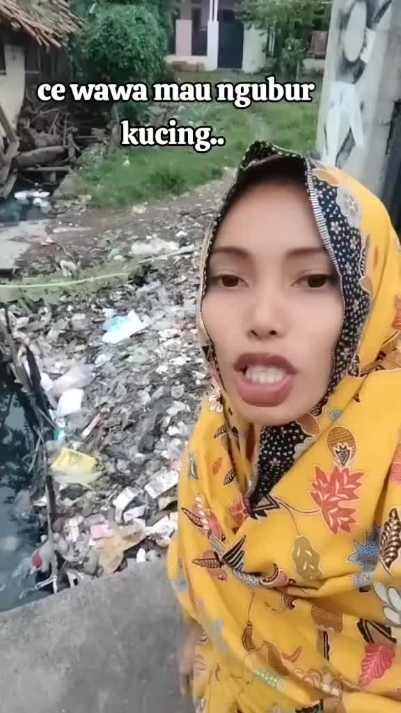 ce wawa ngubur mayat kucing. 