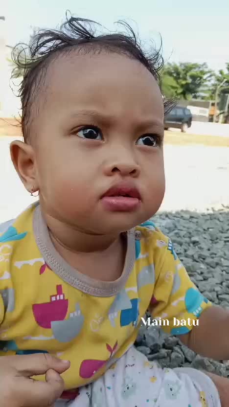 Bermain dengan batu