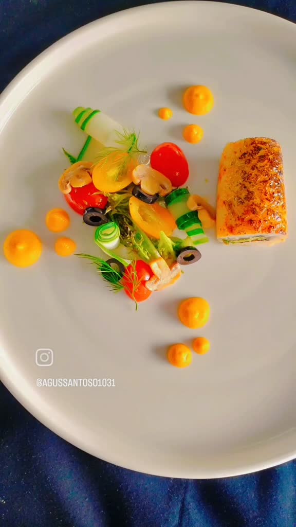 Fish Roll coriander  with tomato salad and carrot puree